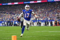 Sep 17, 2026; Orchard Park, New York, USA; Buffalo Bills quarterback Josh Allen (17) runs to score a touchdown against the Detroit Lions during the second half at New Highmark Stadium. Mandatory Credit: Gregory Fisher-Imagn Images