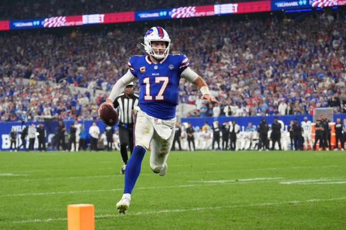 Sep 17, 2026; Orchard Park, New York, USA; Buffalo Bills quarterback Josh Allen (17) runs to score a touchdown against the Detroit Lions during the second half at New Highmark Stadium. Mandatory Credit: Gregory Fisher-Imagn Images