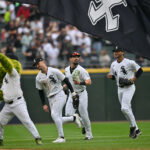 Sep 19, 2026; Chicago, Illinois, USA; Chicago White Sox center fielder Brenton Doyle (7), outfielder Randal Grichuk (34) and right fielder Braden Montgomery (24) celebrate after defeating the Detroit Tigers at Rate Field. Mandatory Credit: Patrick Gorski-Imagn Images