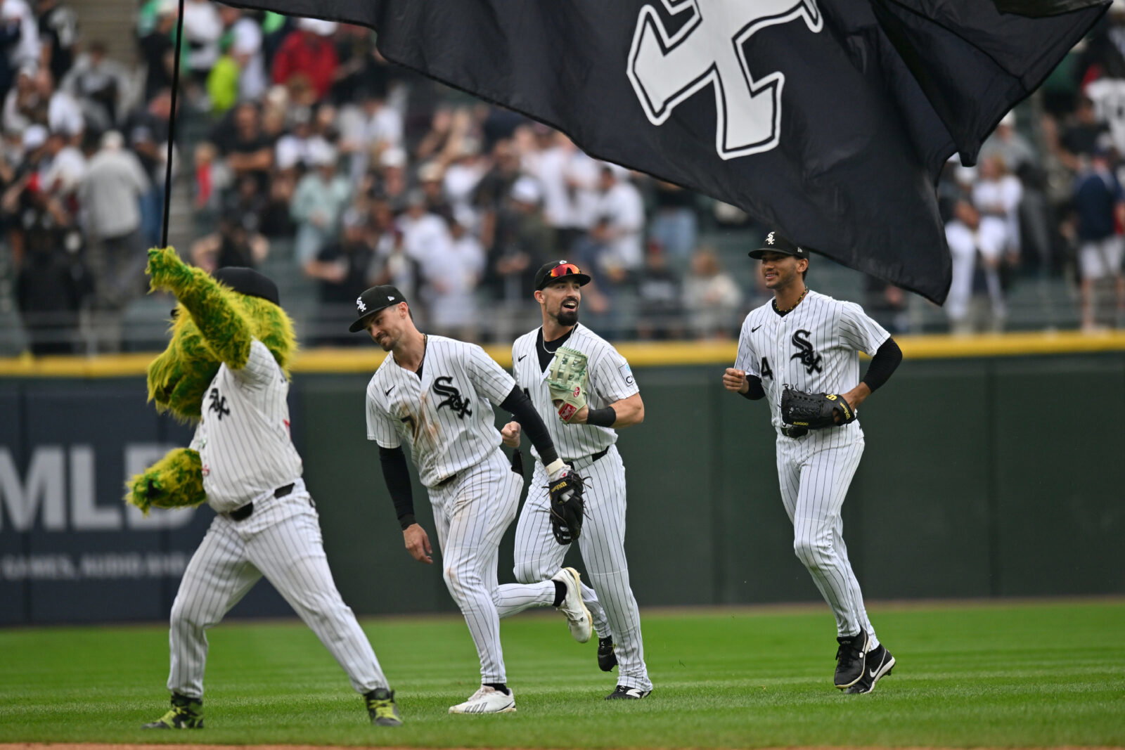 Sep 19, 2026; Chicago, Illinois, USA; Chicago White Sox center fielder Brenton Doyle (7), outfielder Randal Grichuk (34) and right fielder Braden Montgomery (24) celebrate after defeating the Detroit Tigers at Rate Field. Mandatory Credit: Patrick Gorski-Imagn Images