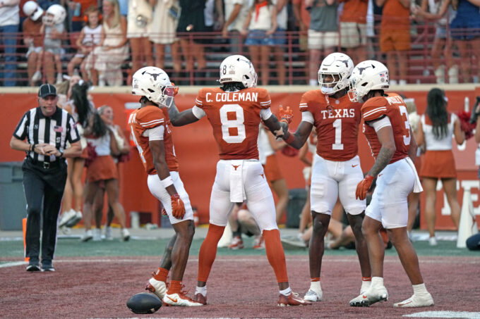 Sep 19, 2026; Austin, Texas, USA; Texas Longhorns wide receiver Cam Coleman (8) celebrates with wide receiver Ryan Wingo (1) and teammates after scoring a touchdown during the first half against the UTSA Roadrunners at Darrell K Royal-Texas Memorial Stadium. Mandatory Credit: Scott Wachter-Imagn Images