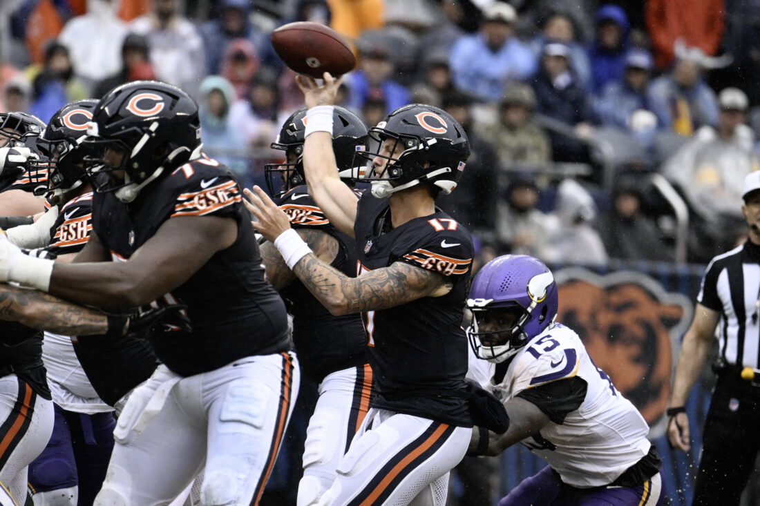 Sep 20, 2026; Chicago, Illinois, USA; Chicago Bears quarterback Tyson Bagent (17) throws a pass against Minnesota Vikings linebacker Dallas Turner (15) during the fourth quarter at Soldier Field. Mandatory Credit: Matt Marton-Imagn Images