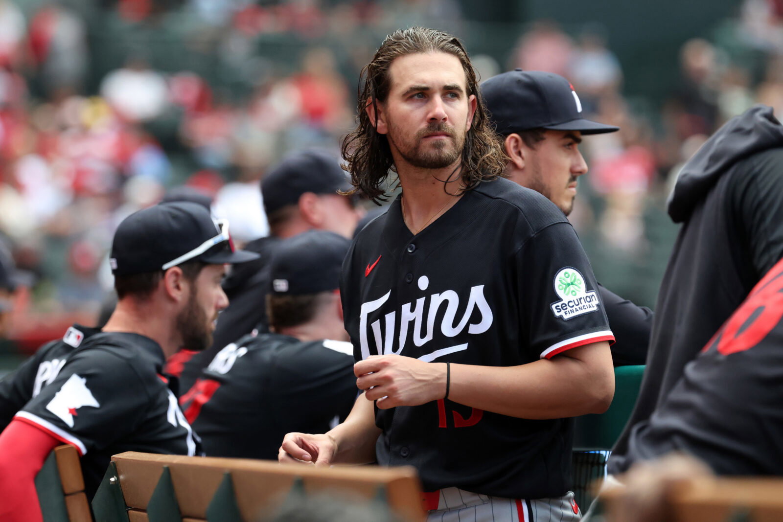 Sep 20, 2026; Anaheim, California, USA; Minnesota Twins pitcher Dean Kremer (13) looks on in the dugout during the seventh inning against the Los Angeles Angels at Angel Stadium. Mandatory Credit: Kiyoshi Mio-Imagn Images