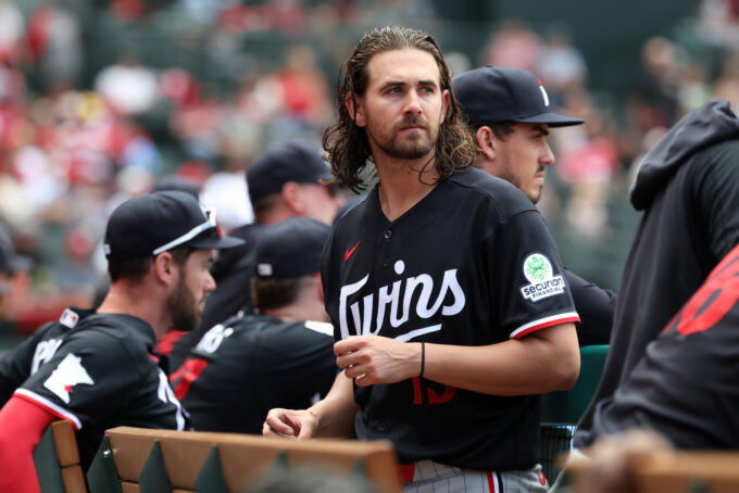 Sep 20, 2026; Anaheim, California, USA; Minnesota Twins pitcher Dean Kremer (13) looks on in the dugout during the seventh inning against the Los Angeles Angels at Angel Stadium. Mandatory Credit: Kiyoshi Mio-Imagn Images