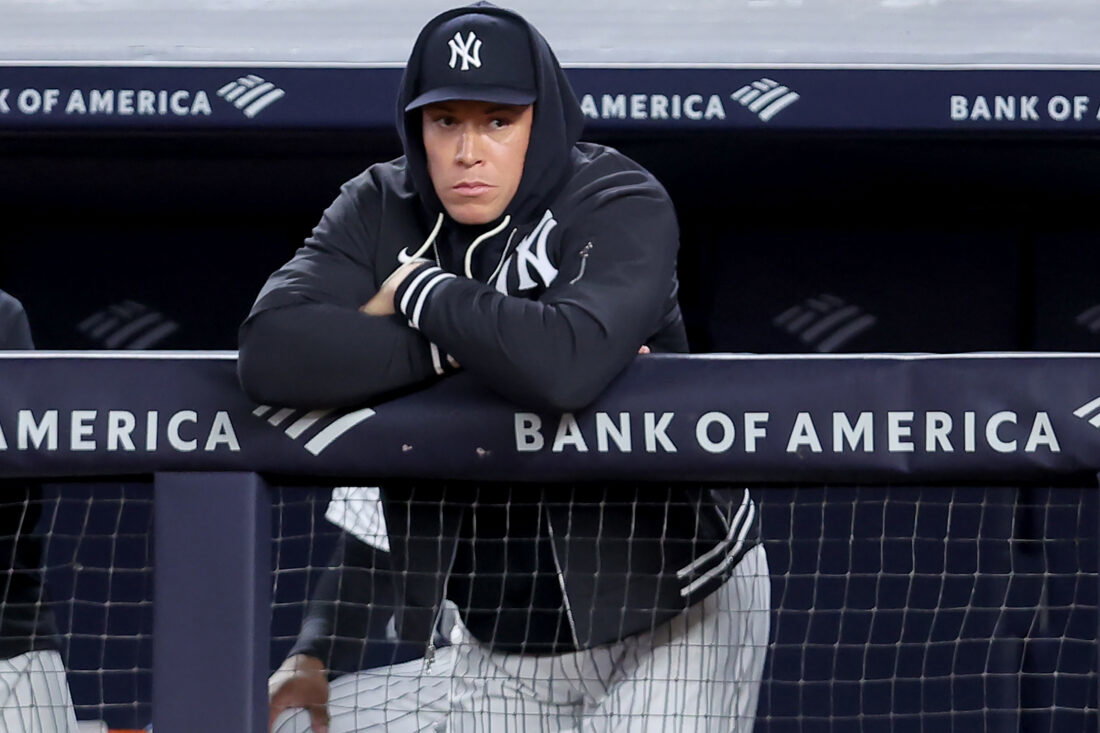 Sep 22, 2026; Bronx, New York, USA; New York Yankees injured right fielder Aaron Judge (99) watches from the dugout during the third inning against the Tampa Bay Rays at Yankee Stadium. Mandatory Credit: Brad Penner-Imagn Images