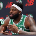 Sep 28, 2026; Boston, MA, USA; Boston Celtics center Mitchell Robinson (4) talks to reporters during media day at Auerbach Center. Mandatory Credit: