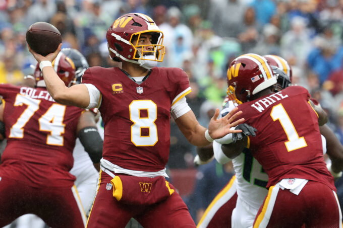 Sep 27, 2026; Landover, Maryland, USA; Washington Commanders quarterback Marcus Mariota (8) passes the ball against the Seattle Seahawks at Northwest Stadium. Mandatory