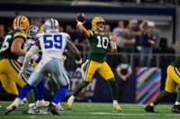 Sep 28, 2025; Arlington, Texas, USA; Green Bay Packers quarterback Jordan Love (10) passes the ball during the game between the Dallas Cowboys and the Green Bay Packers at AT&T Stadium. Mandatory Credit: Jerome Miron-Imagn Images