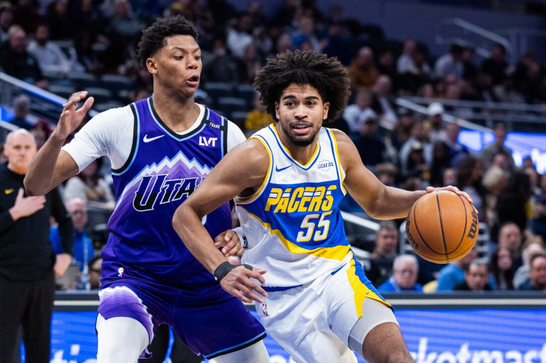 Feb 3, 2026; Indianapolis, Indiana, USA; Indiana Pacers guard Ethan Thompson (55) dribbles the ball while Utah Jazz forward Ace Bailey (19) defends in the second half at Gainbridge Fieldhouse. Mandatory Credit: Trevor Ruszkowski-Imagn Images