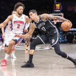 Mar 10, 2026; Brooklyn, New York, USA; Brooklyn Nets forward Michael Porter Jr. (17) looks to drive past Detroit Pistons guard Cade Cunningham (2) in the first quarter at Barclays Center. Mandatory Credit: Wendell Cruz-Imagn Images