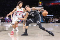 Mar 10, 2026; Brooklyn, New York, USA; Brooklyn Nets forward Michael Porter Jr. (17) looks to drive past Detroit Pistons guard Cade Cunningham (2) in the first quarter at Barclays Center. Mandatory Credit: Wendell Cruz-Imagn Images