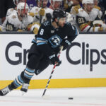 May 1, 2026; Salt Lake City, Utah, USA; Utah Mammoth center Nick Schmaltz (8) plays the puck against the Vegas Golden Knights during the first period in game six of the first round of the 2026 Stanley Cup Playoffs at Delta Center. Mandatory Credit: Rob Gray-Imagn Images
