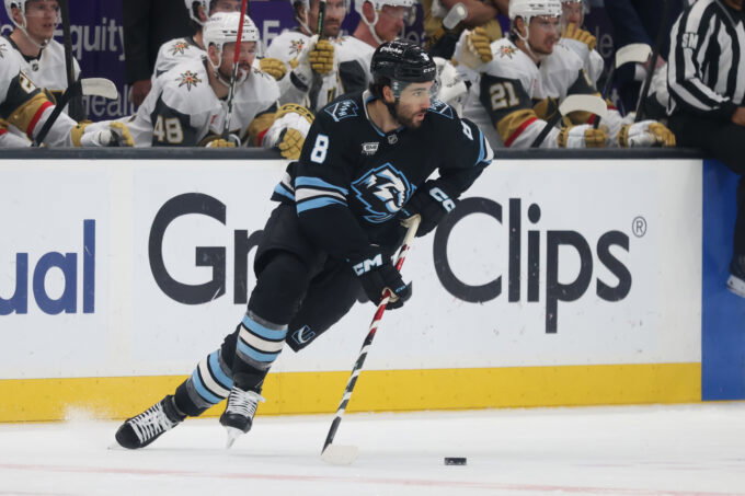 May 1, 2026; Salt Lake City, Utah, USA; Utah Mammoth center Nick Schmaltz (8) plays the puck against the Vegas Golden Knights during the first period in game six of the first round of the 2026 Stanley Cup Playoffs at Delta Center. Mandatory Credit: Rob Gray-Imagn Images