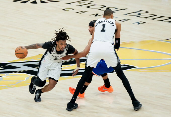 Jun 13, 2026; San Antonio, Texas, USA; San Antonio Spurs guard Stephon Castle (5) dribbles around a screen from San Antonio Spurs forward Victor Wembanyama (1) against New York Knicks guard Josh Hart (3) in the second half during game five of the 2026 NBA Finals at Frost Bank Center. Mandatory Credit: Scott Wachter-Imagn Images