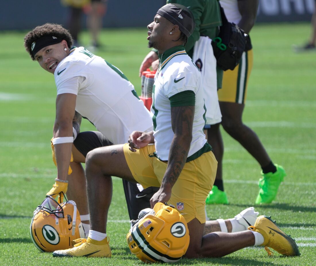 Green Bay Packers wide receivers Christian Watson (9, back) and Matthew Golden (0) are shown during the first day of training camp Wednesday, July 29, 2026 in Green Bay, Wisconsin. It is the first of three consecutive public practices.