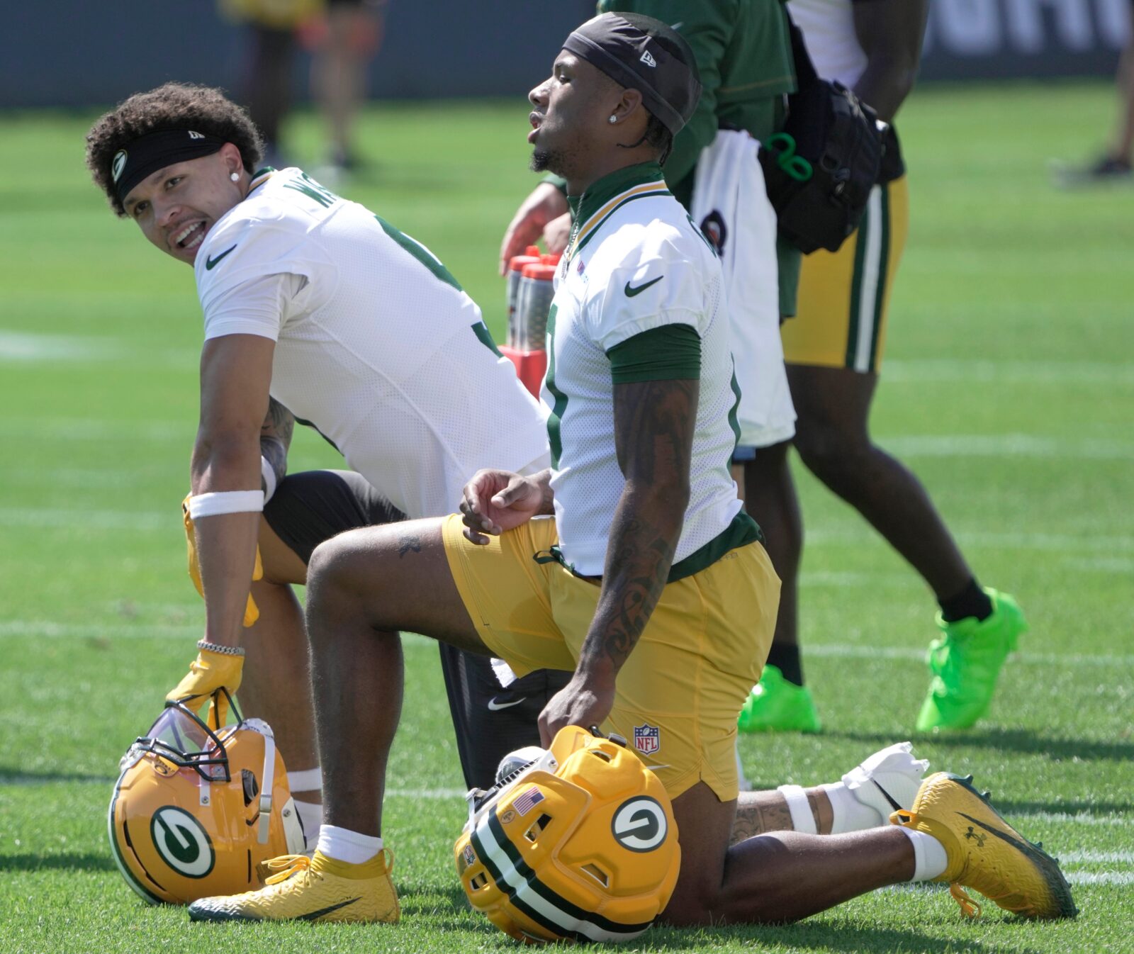 Green Bay Packers wide receivers Christian Watson (9, back) and Matthew Golden (0) are shown during the first day of training camp Wednesday, July 29, 2026 in Green Bay, Wisconsin. It is the first of three consecutive public practices.