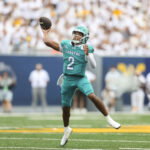 Sep 5, 2026; Morgantown, West Virginia, USA; Coastal Carolina Chanticleers quarterback Deuce Bailey (2) throws a pass during the third quarter against the Coastal Carolina Chanticleers at Milan Puskar Stadium. Mandatory Credit: Ben Queen-Imagn Images