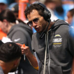Sep 13, 2026; Inglewood, California, USA; Los Angeles Chargers offensive coordinator Mike McDaniel on the sidelines during the first half against the Arizona Cardinals at SoFi Stadium.