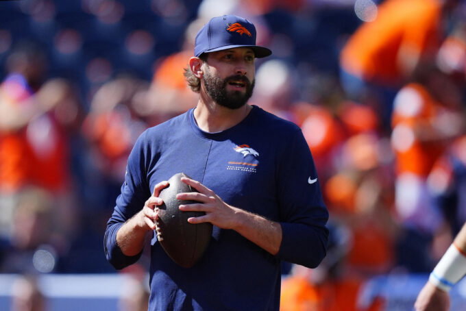 Sep 20, 2026; Denver, Colorado, USA; Denver Broncos offensive coordinator Davis Webb on the field prior to a game Jacksonville Jaguars at Empower Field at Mile High. Mandatory Credit: Ron Chenoy-Imagn Images