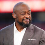 Sep 27, 2026; Denver, Colorado, USA; NBC broadcast analyst Mike Tomlin before the game between Los Angeles Rams and Denver Broncos at Empower Field at Mile High. Mandatory Credit: Ron Chenoy-Imagn Images