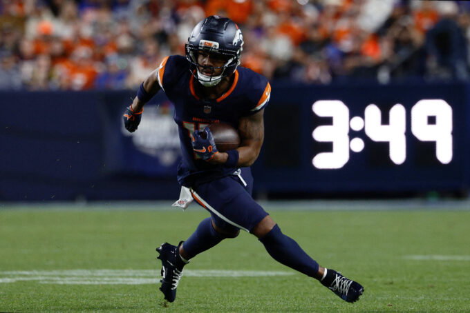 Sep 27, 2026; Denver, Colorado, USA; Denver Broncos wide receiver Jaylen Waddle (17) runs against the Los Angeles Rams during the second half at Empower Field at Mile High. Mandatory Credit: Isaiah J. Downing-Imagn Images