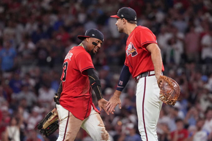 Oct 1, 2026; Cumberland, Georgia, USA; Atlanta Braves outfielder Ronald Acuna Jr. (13) celebrates with infielder Matt Olson (28) after defeating the Philadelphia Phillies in game three of the Wildcard round for the 2026 MLB Playoffs at Truist Field. Mandatory Credit: Dale Zanine-Imagn Images
