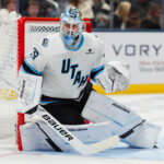 Oct 3, 2026; Columbus, Ohio, USA; Utah Mammoth goaltender Sebastian Cossa (33) defends the net against the Columbus Blue Jackets in the first period at Nationwide Arena. Mandatory Credit: Aaron Doster-Imagn Images