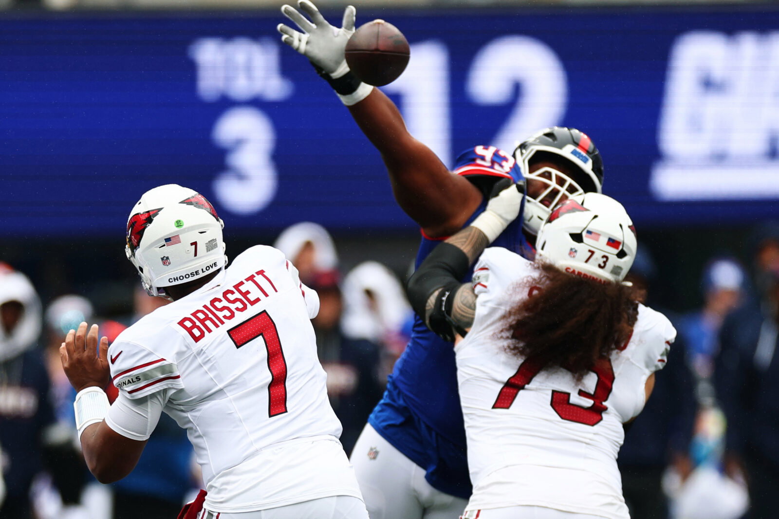 Oct 4, 2026; East Rutherford, New Jersey, USA; New York Giants defensive line Shelby Harris (93) deflects a pass as Arizona Cardinals guard Isaac Seumalo (73) blocks during the second quarter at MetLife Stadium. Mandatory Credit: Vincent Carchietta-Imagn Images
