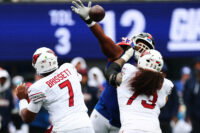Oct 4, 2026; East Rutherford, New Jersey, USA; New York Giants defensive line Shelby Harris (93) deflects a pass as Arizona Cardinals guard Isaac Seumalo (73) blocks during the second quarter at MetLife Stadium. Mandatory Credit: Vincent Carchietta-Imagn Images