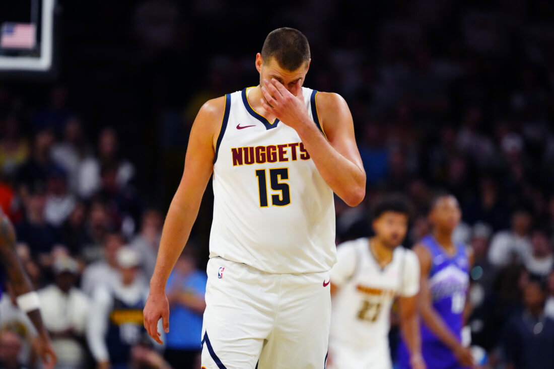 Oct 4, 2026; Boulder, Colorado, USA; Denver Nuggets center Nikola Jokic (15) reacts in the second quarter against the Utah Jazz at CU Events Center. Mandatory Credit: Ron Chenoy-Imagn Images