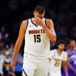 Oct 4, 2026; Boulder, Colorado, USA; Denver Nuggets center Nikola Jokic (15) reacts in the second quarter against the Utah Jazz at CU Events Center. Mandatory Credit: Ron Chenoy-Imagn Images