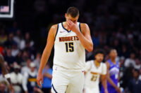 Oct 4, 2026; Boulder, Colorado, USA; Denver Nuggets center Nikola Jokic (15) reacts in the second quarter against the Utah Jazz at CU Events Center. Mandatory Credit: Ron Chenoy-Imagn Images