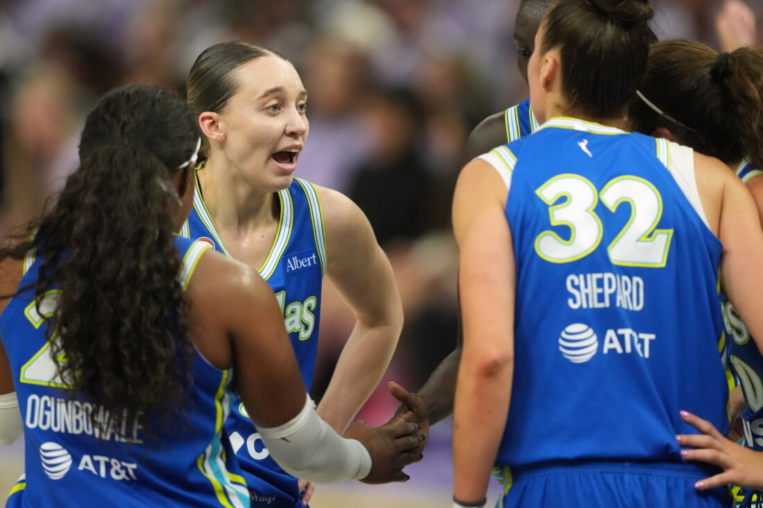 Oct 2, 2026; San Francisco, California, USA; Dallas Wings guard Paige Bueckers (second from left) talks with teammates during the third quarter of game three of the first round for the 2026 WNBA Playoffs at Chase Center. Mandatory Credit: Darren Yamashita-Imagn Images