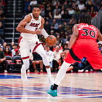 Oct 3, 2026; Quebec City, Quebec, CAN; Miami Heat forward Giannis Antetokounmpo (7) dribbles the ball against the Toronto Raptors during the second quarter at Videotron Centre. Mandatory Credit: David Kirouac-Imagn Images