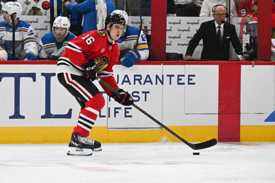 Oct 6, 2026; Chicago, Illinois, USA; Chicago Blackhawks center Anton Frondell (16) moves the puck against the St. Louis Blues during the first period at United Center. Mandatory Credit: Matt Marton-Imagn Images