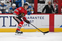 Oct 6, 2026; Chicago, Illinois, USA; Chicago Blackhawks center Anton Frondell (16) moves the puck against the St. Louis Blues during the first period at United Center. Mandatory Credit: Matt Marton-Imagn Images