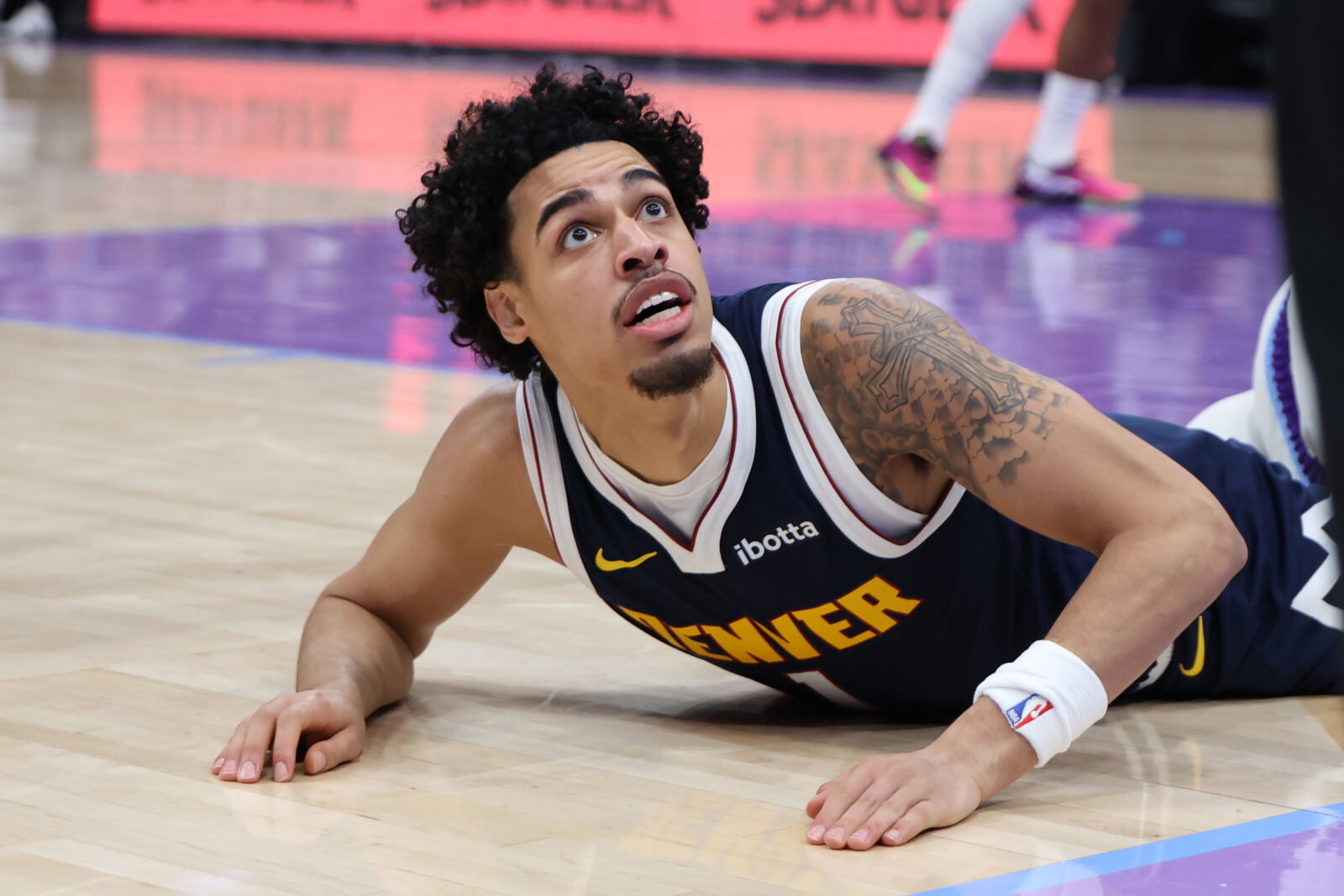 Oct 6, 2026; Salt Lake City, Utah, USA; Denver Nuggets guard Julian Strawther (1) reacts to a play during the second half of a game against the Utah Jazz at Delta Center. Mandatory Credit: Rob Gray-Imagn Images