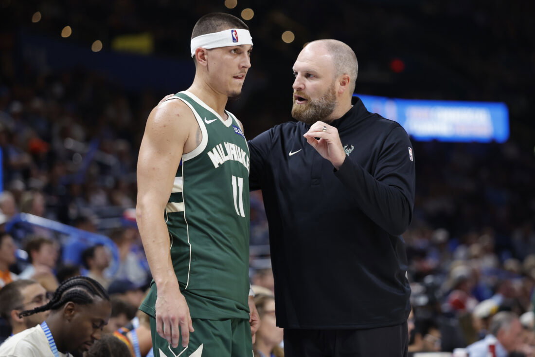Oct 7, 2026; Oklahoma City, Oklahoma, USA; Milwaukee Bucks head coach Taylor Jenkins talks to Milwaukee Bucks guard Tyler Herro (11) during the second half of a preseason game at Paycom Center. Mandatory Credit: Alonzo Adams-Imagn Images
