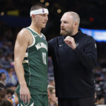 Oct 7, 2026; Oklahoma City, Oklahoma, USA; Milwaukee Bucks head coach Taylor Jenkins talks to Milwaukee Bucks guard Tyler Herro (11) during the second half of a preseason game at Paycom Center. Mandatory Credit: Alonzo Adams-Imagn Images