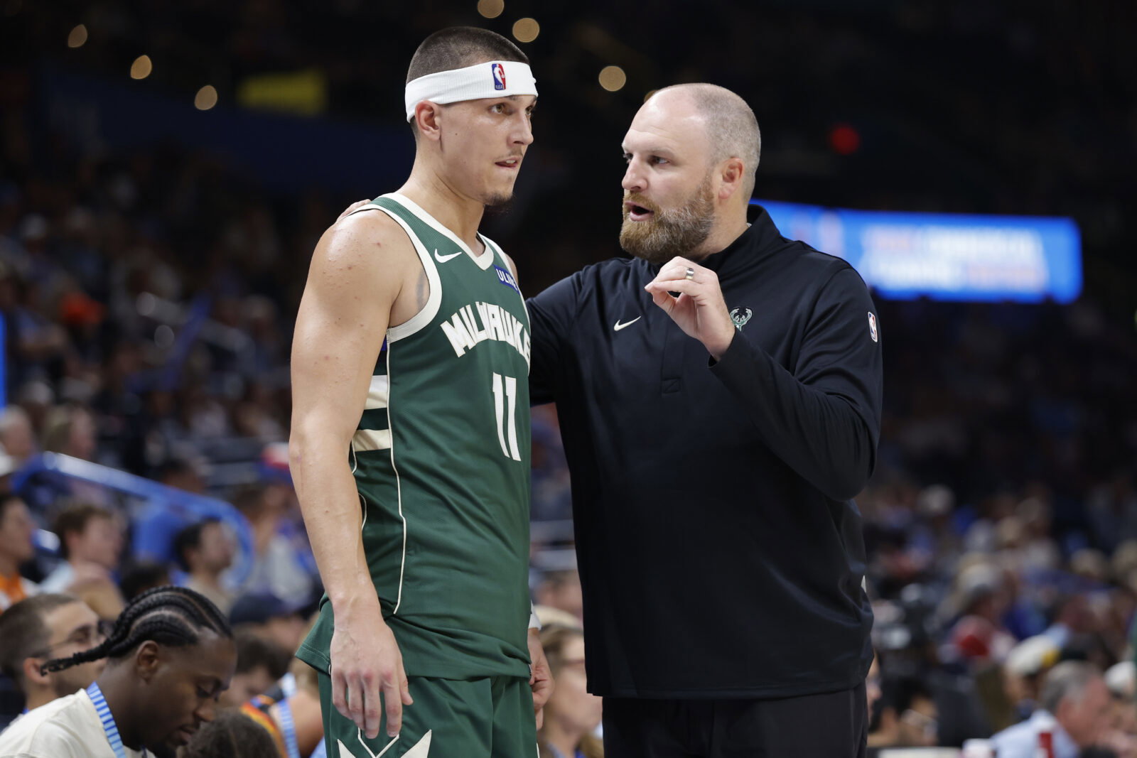 Oct 7, 2026; Oklahoma City, Oklahoma, USA; Milwaukee Bucks head coach Taylor Jenkins talks to Milwaukee Bucks guard Tyler Herro (11) during the second half of a preseason game at Paycom Center. Mandatory Credit: Alonzo Adams-Imagn Images