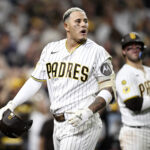 Oct 7, 2026; San Diego, California, USA; San Diego Padres third baseman Manny Machado (13) reacts after hitting a fly ball that was caught at the wall during the eighth inning against the Milwaukee Brewers in game four of the NLDS for the 2026 MLB Playoffs at Petco Park. Mandatory Credit: Denis Poroy-Imagn Images
