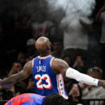 Oct 8, 2026; Brooklyn, New York, USA; Philadelphia 76ers forward Lebron James (23) tosses powder into the air before the start of the game against the Brooklyn Nets at Barclays Center. Mandatory Credit: John Jones-Imagn Images