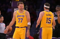 Oct 8, 2026; Los Angeles, California, USA; Los Angeles Lakers guard Luka Doncic (77) and guard Austin Reaves (15) on the court during the first half the Sacramento Kings at Crypto.com Arena. Mandatory Credit: Jayne Kamin-Oncea-Imagn Images
