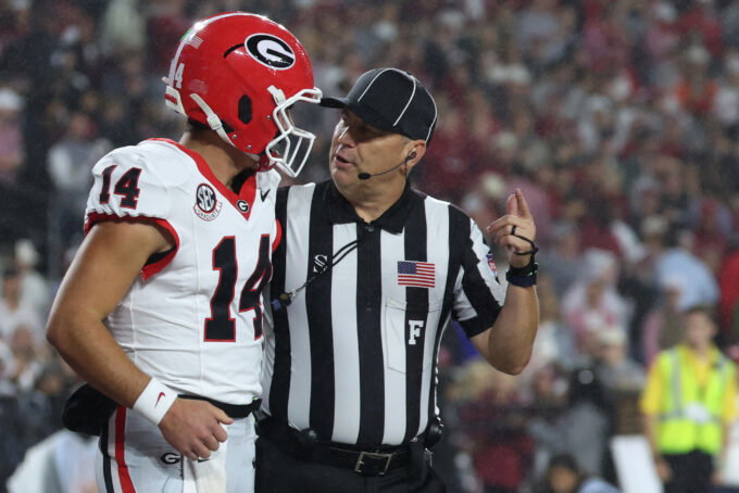 Oct 10, 2026; Tuscaloosa, Alabama, USA; Georgia Bulldogs quarterback Gunner Stockton (14) speaks with a referee before the game against the Alabama Crimson Tide at Saban Field at Bryant-Denny Stadium. Mandatory Credit: David Leong-Imagn Images
