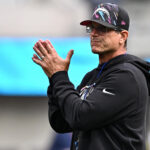 Oct 11, 2026; Inglewood, California, USA; Los Angeles Chargers head coach Jim Harbaugh is seen prior to the game against the Denver Broncos at SoFi Stadium. Mandatory Credit: William Liang-Imagn Images