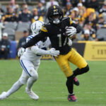 Oct 11, 2026; Pittsburgh, Pennsylvania, USA; Pittsburgh Steelers wide receiver Germie Bernard (17) runs with the ball after a catch while defended by Indianapolis Colts safety Cam Bynum (0) in the fourth quarter at Acrisure Stadium. Mandatory Credit: Charles LeClaire-Imagn Images