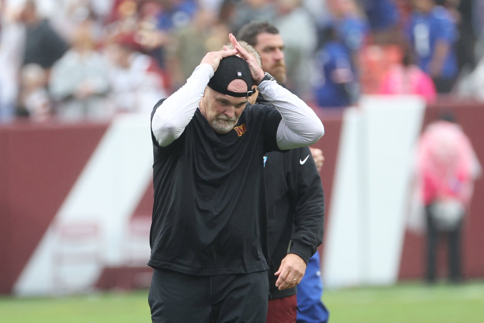 Oct 11, 2026; Landover, Maryland, USA; Washington Commanders head coach Dan Quinn reacts after the game against the New York Giants at Northwest Stadium. Mandatory Credit: Amber Searls-Imagn Images