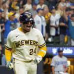 Oct 12, 2026; Milwaukee, Wisconsin, USA; Milwaukee Brewers catcher William Contreras (24) reacts while running after hitting an RBI single against Los Angeles Dodgers pitcher Brock Stewart (not pictured) during the sixth inning in game two of the NLCS for the 2026 MLB Playoffs at American Family Field. Mandatory Credit: Michael McLoone-Imagn Images