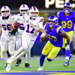 Oct 12, 2026; Inglewood, California, USA; Buffalo Bills quarterback Josh Allen (17) scrambles as Los Angeles Rams linebacker Nate Landman (53) defends during overtime at SoFi Stadium. Mandatory Credit: