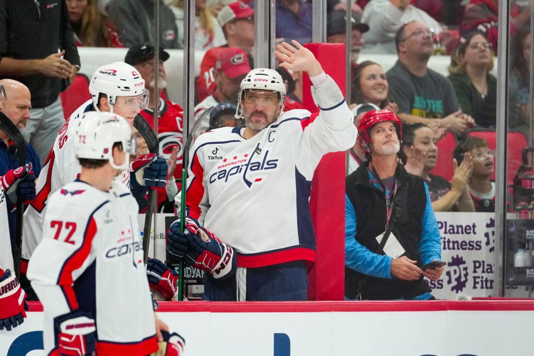 Oct 13, 2026; Raleigh, North Carolina, USA; Washington Capitals left wing Alex Ovechkin (8) waves to the crowd against the Carolina Hurricanes during the first period at Lenovo Center. Mandatory Credit: James Guillory-Imagn Images